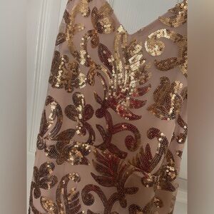 Bebe women’s fitted midi bodycon drees.
Gold